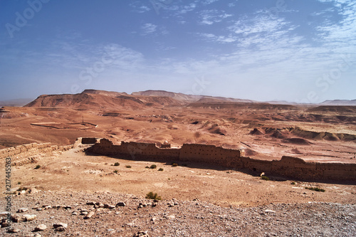 Desert and fragment of the medieval fortifications at Ait Ben Haddouw in Morocco.