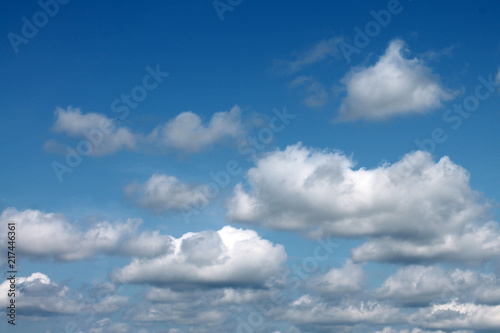  white clouds against blue sky for background closeup
