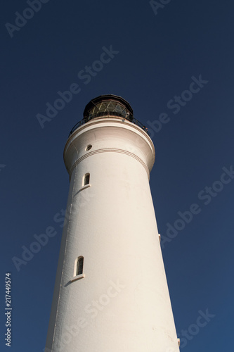 White Lighthouse with sun reflection and lens flare, Hirtshals Fyr in Hirtshals, North Jutland in Denmark, Europe