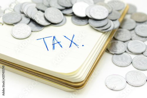 TAX with coins. Image use for Tax calculation every year for everyone.