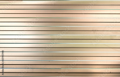 Texture of a sheet of ribbed metal. Reflective background
