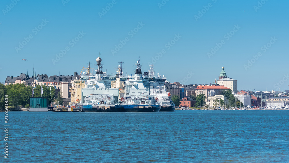 Helsinki in Finland, panorama of the town from the sea, with the harbor and the cathedral in background 
