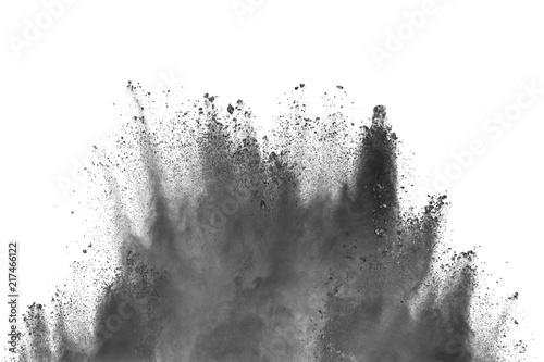 Black powder explosion against white background.