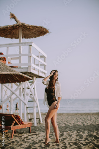 Young woman posing on the beach