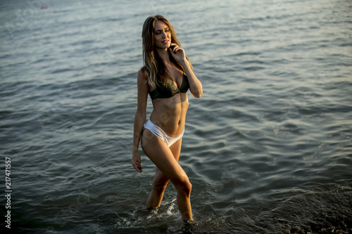 Pretty young woman at sea