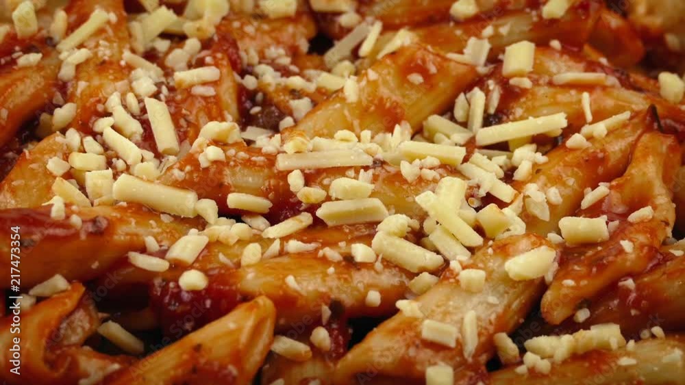 Grated Cheese Added To Pasta Dish Grated Cheese Added To Pasta Dish