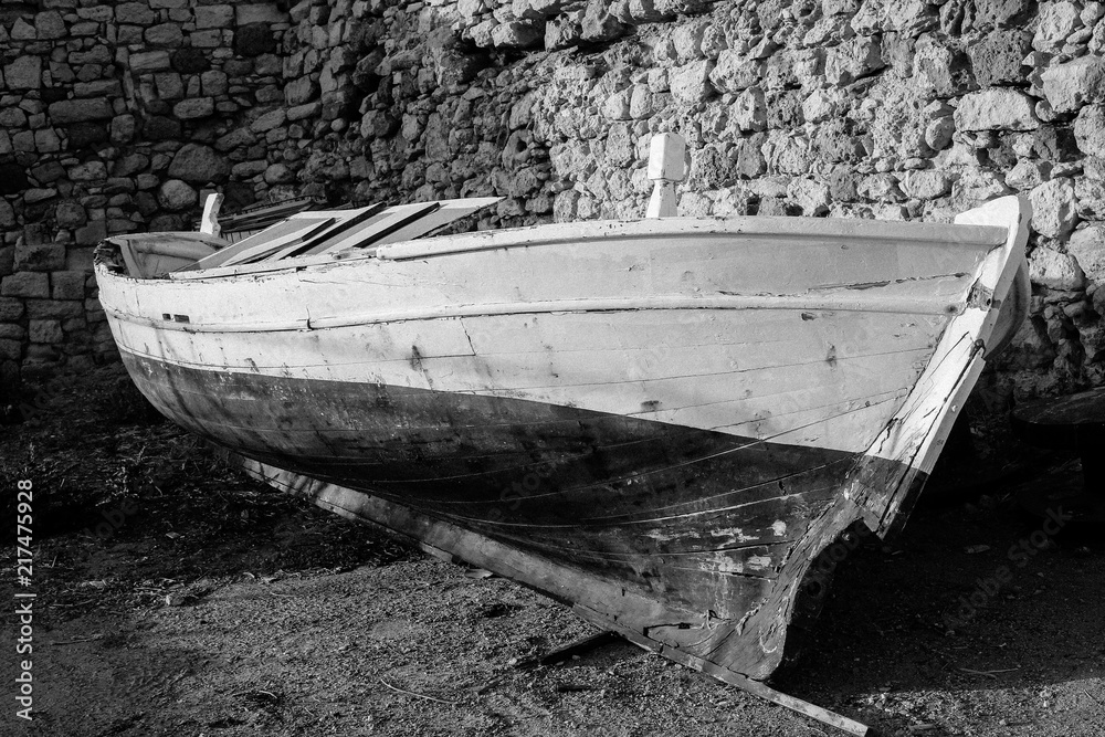 Wooden black and white fishing boat