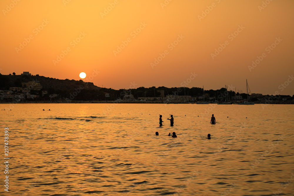 Sunset on the sandy beach in San Vito Lo Capo, Sicily