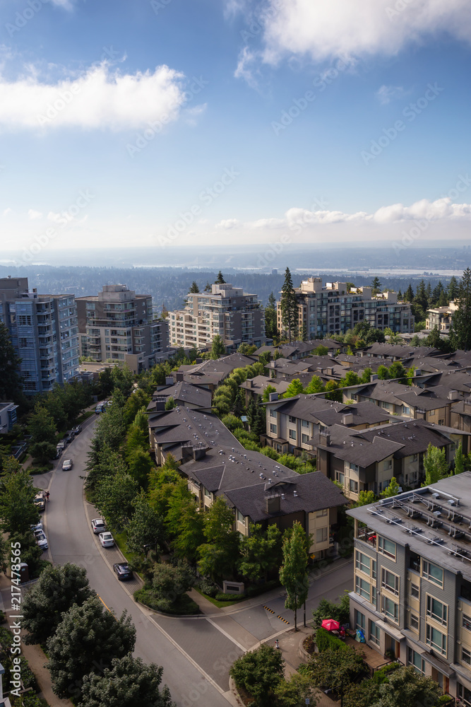Aerial view of residential homes and buildings on top of Burnaby Mountain. Taken in Vancouver, British Columbia, Canada. Aerial view of residential homes and buildings on top of Burnaby Mountain. Taken in Vancouver, British Columbia, Canada.