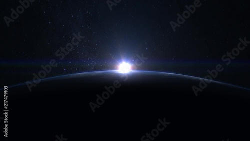 Sunrise over the Earth. Stars twinkle. The earth slowly rotates. Realistic atmosphere. Volumetric clouds. View from space. Starry sky. 4K.