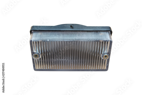 Closeup of car headlight isolated on white background, Clipping path included.