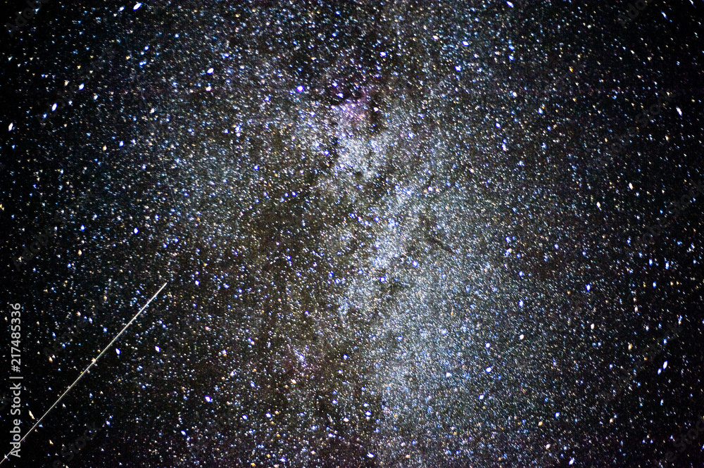Obraz premium The starry sky. Space. Stars, meteors, the Milky Way. Astonomy.
