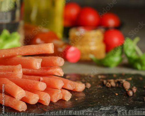 salami cheese-dried smoked sliced ​​slices (sausages) . food background photo