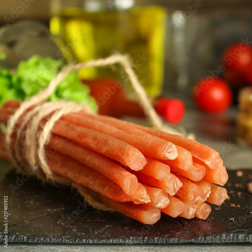 salami cheese-dried smoked sliced ​​slices (sausages) . food background photo