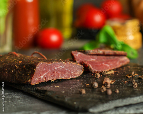 salami cheese-dried smoked sliced ​​slices (sausages) . food background photo