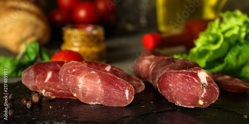 salami cheese-dried smoked sliced ​​slices (sausages) . food background photo