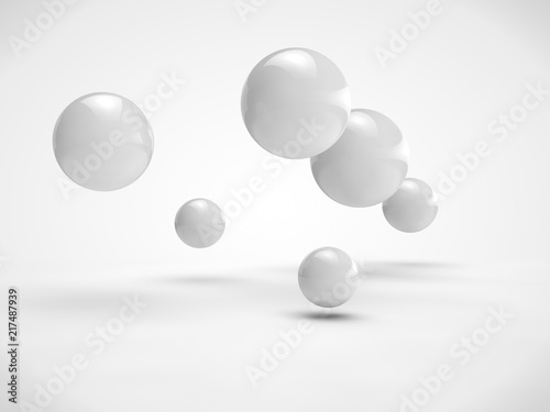 The image of the set of balls of different size, white color, randomly located in space. Image isolated on a white background. 3D rendering