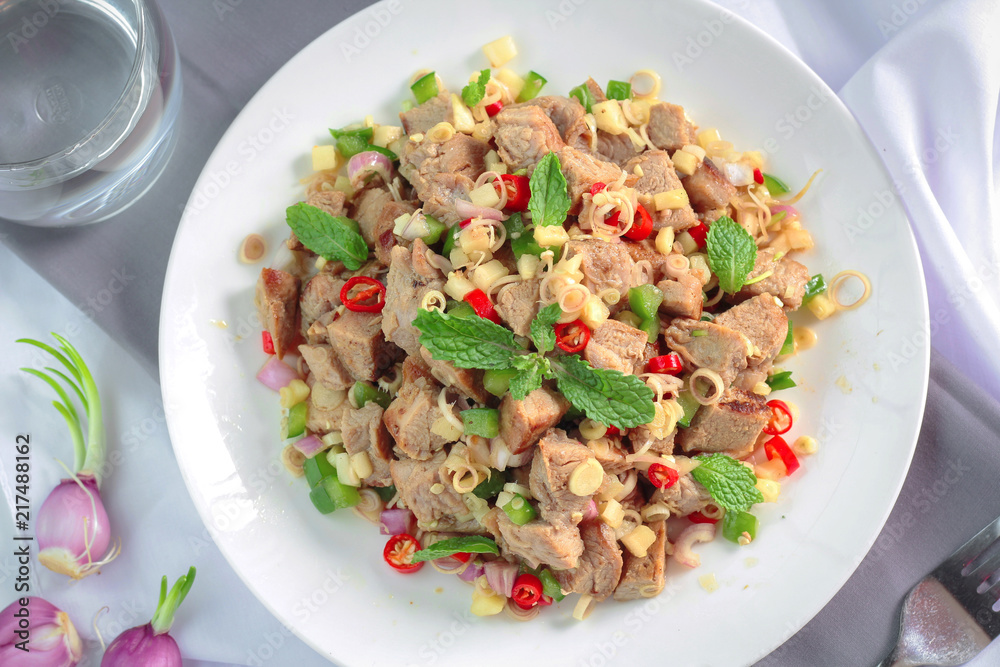 Spicy grilled pork salad with lemon grass and ginger Spicy grilled pork salad with lemon grass and ginger