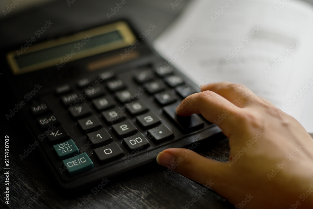 a person counts on a calculator a person counts on a calculator