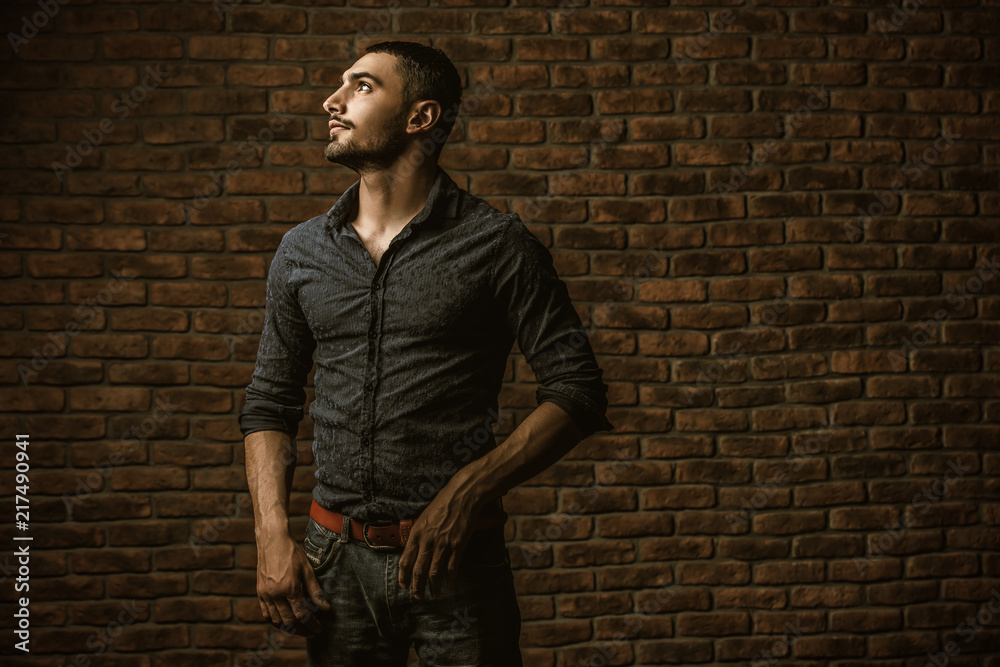 man on brick wall background man on brick wall background