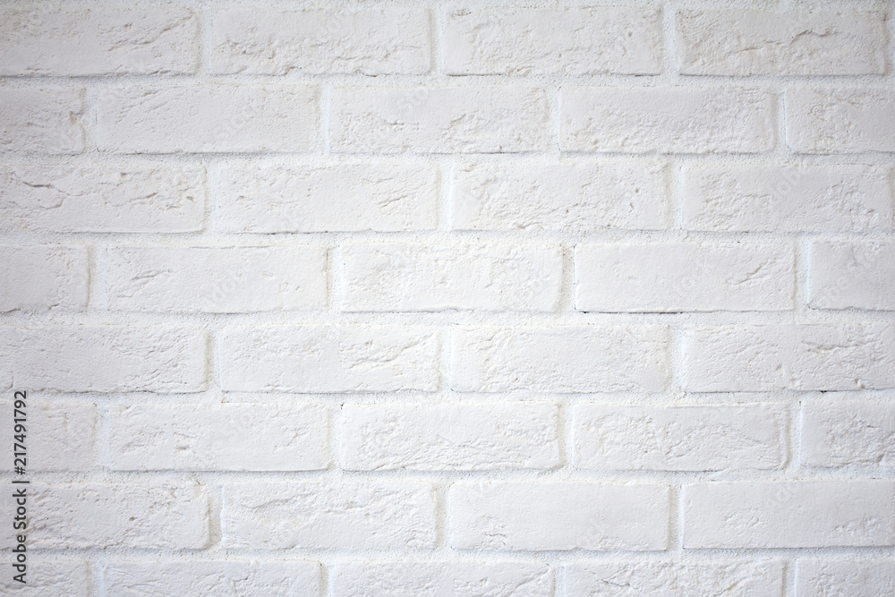 Naklejka premium Biały mur z cegły