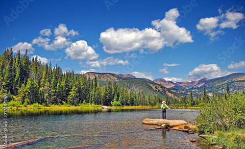 Hiker at Lost Lake in the Indian Peaks Wilderness, Boulder  County, Colorado photo