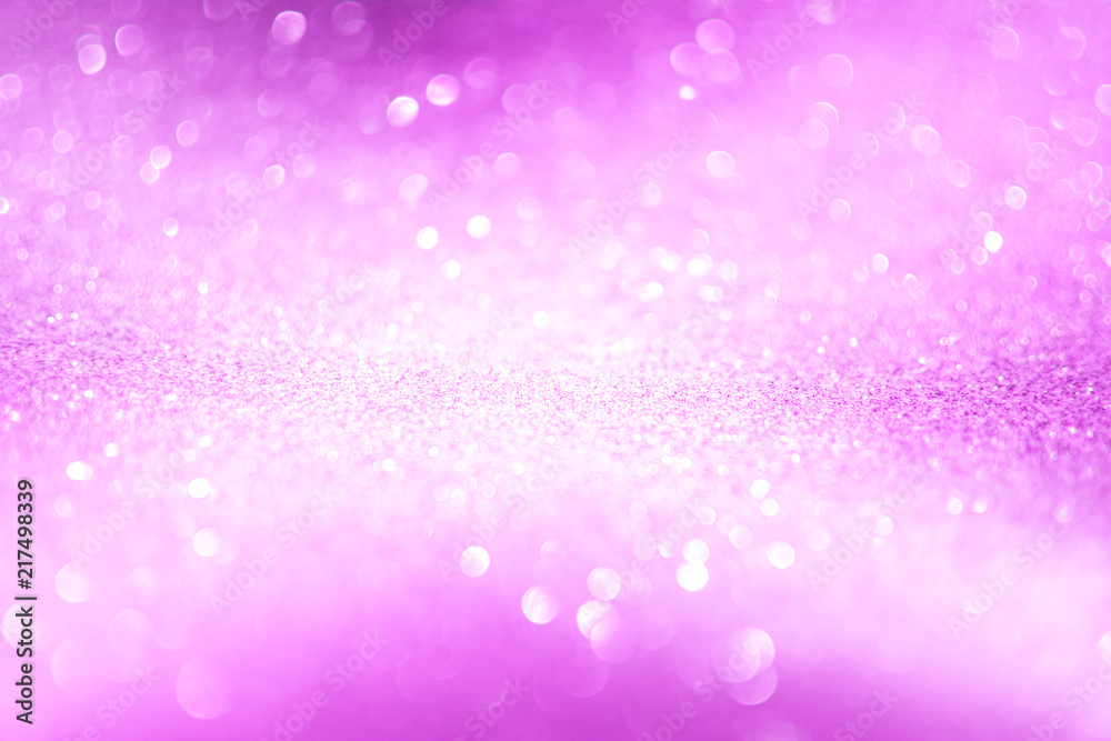 Pink glitter background, closeup, shallow depth of field.