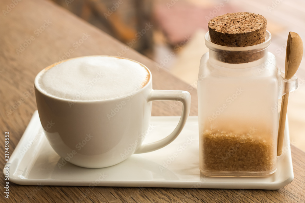 Coffee cup with milk,cappuccino coffee with brown sugar Coffee cup with milk,cappuccino coffee with brown sugar