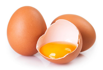 Raw eggs on white background