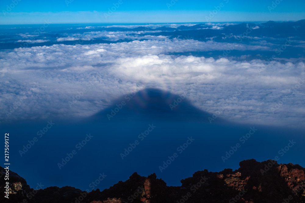 The Brocken Spectre and Rainbow on the top of the Shadow Fuji the Mt.Fuji in Japan