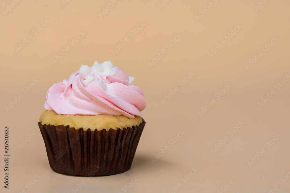 sweet cup cake dessert on yellow background and copy space