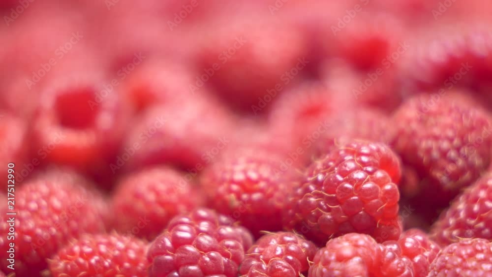 Fresh sweet raspberries background. Ripe raspberry dolly shot close-up Fresh sweet raspberries background. Ripe raspberry dolly shot close-up