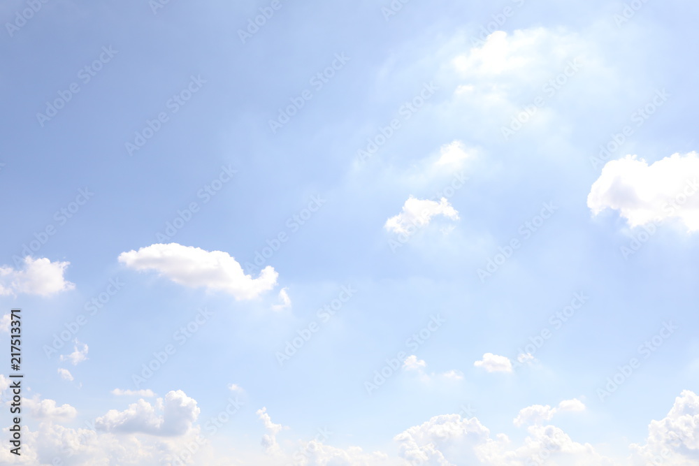 Fototapeta premium Cloudy blue sky abstract background, blue sky background with tiny clouds