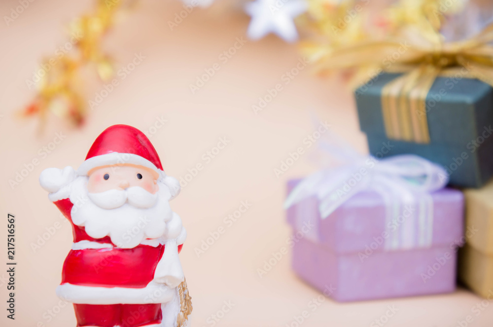 santa claus doll christmas background and gift box and copy space santa claus doll christmas background and gift box and copy space