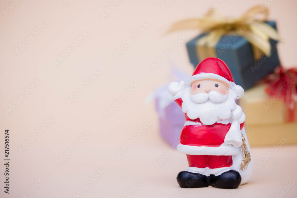 santa claus doll christmas background and gift box and copy space santa claus doll christmas background and gift box and copy space