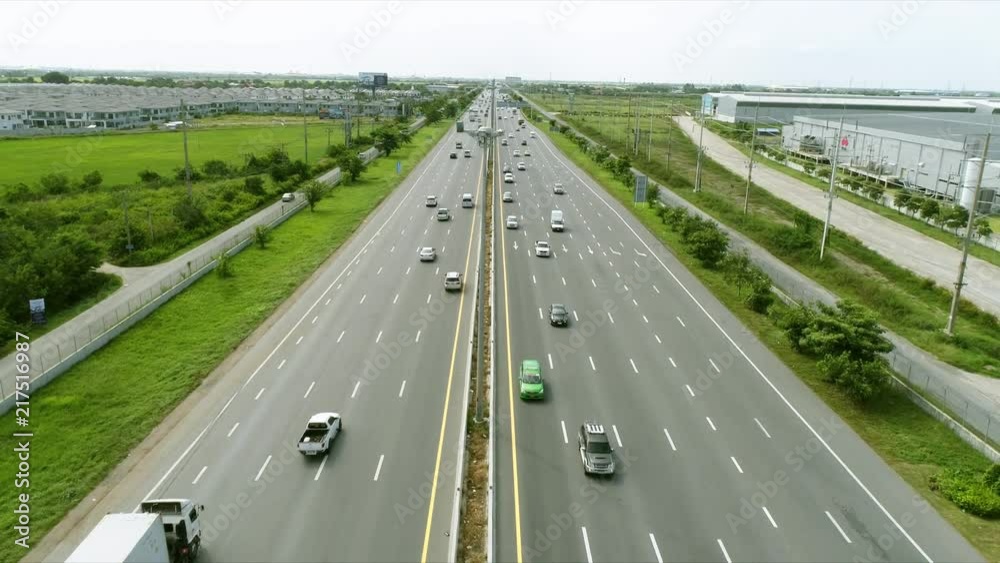 Aerial view of the motorway and expressway in Thailand. It is a way to connect the city to the capital. Aerial view of the motorway and expressway in Thailand. It is a way to connect the city to the capital.