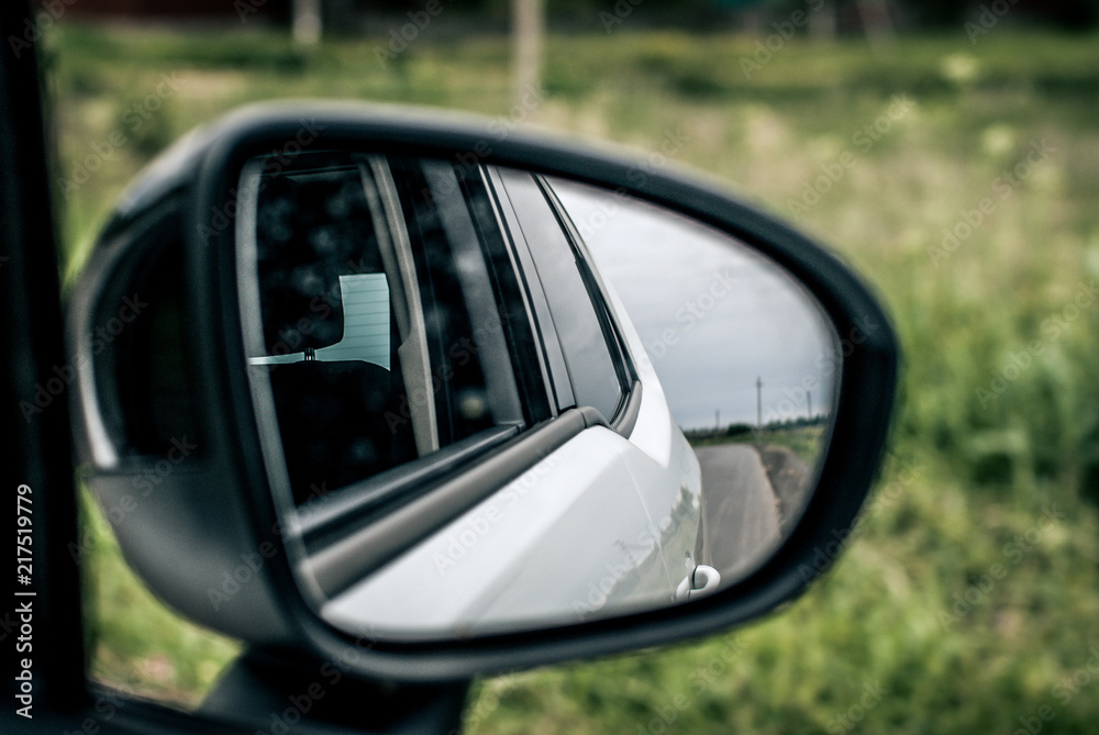 Reflection in a rear-view mirror 
