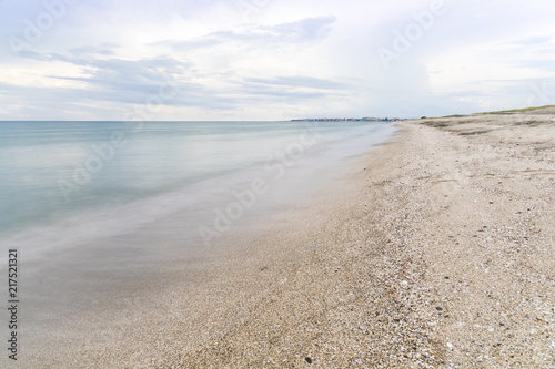 The beauty of the sandy beach on the spit between Pomorie and Aheloy. Pomorie lake. Pomorie spit. Bulgaria