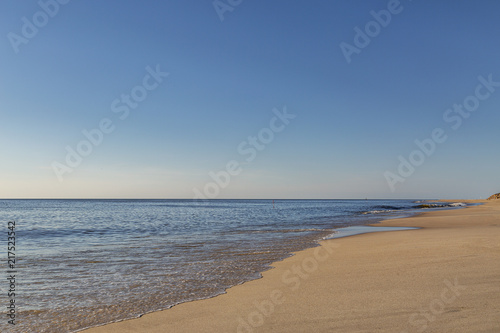 Fototapeta Naklejka Na Ścianę i Meble -  The Day at Sylt-Wenningstedt Beach ends/ Germany