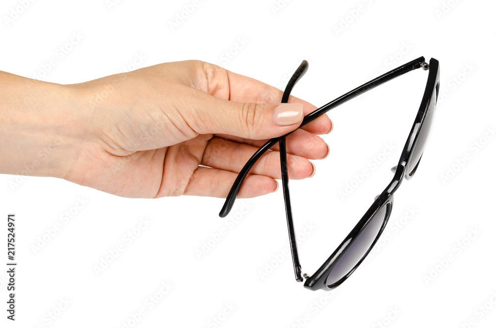 Stylish plastic sunglasses with hand isolated on white background Stylish plastic sunglasses with hand isolated on white background