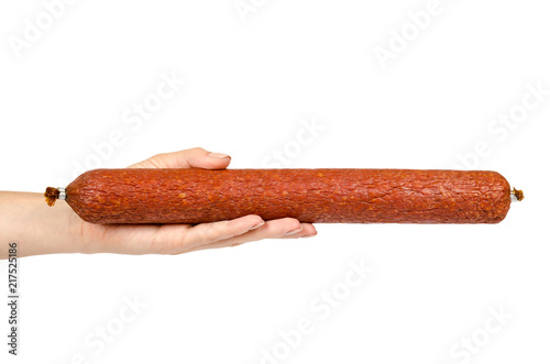 smoked salami sausage piece with hand, isolated on white background