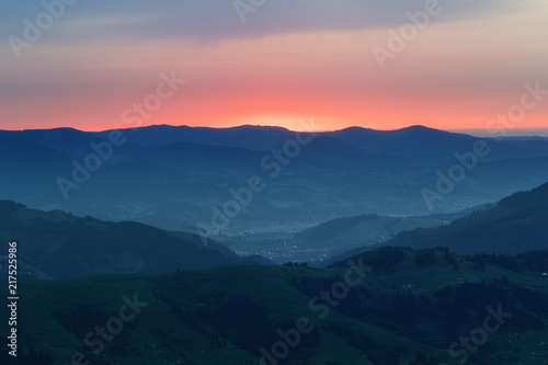 Dawn in the mountains. Picturesque tranquil landscape in natural post production style. Location - Carpathian mountains in Ukraine, the segment of Alpine mountain system.