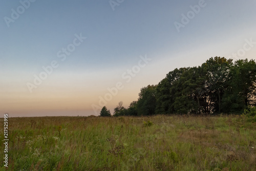 Magic landscape is evening, sunset over the field.