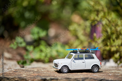 Mini toy car with sufboard on roof figurine for summer holiday