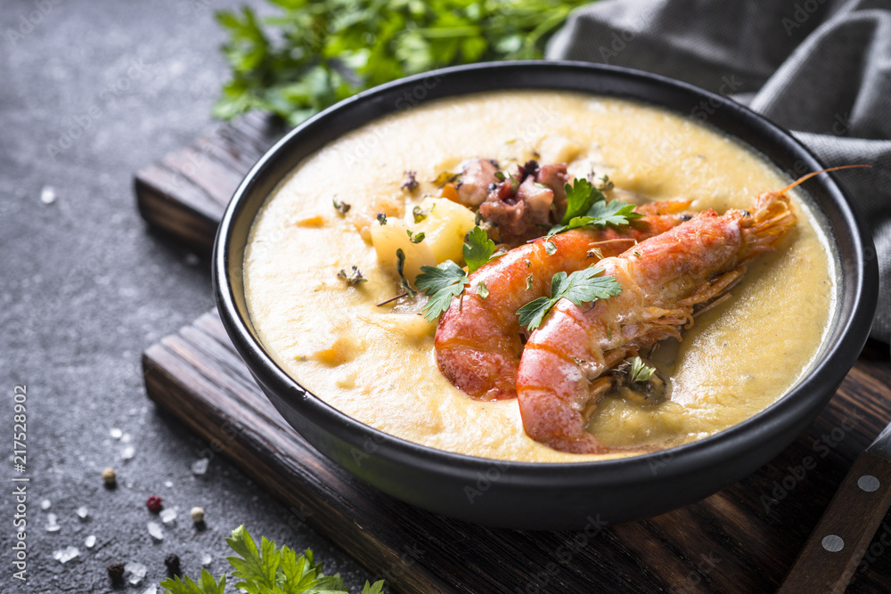 Chowder soup with seafood and prawn shrimps. Chowder soup with seafood and prawn shrimps.