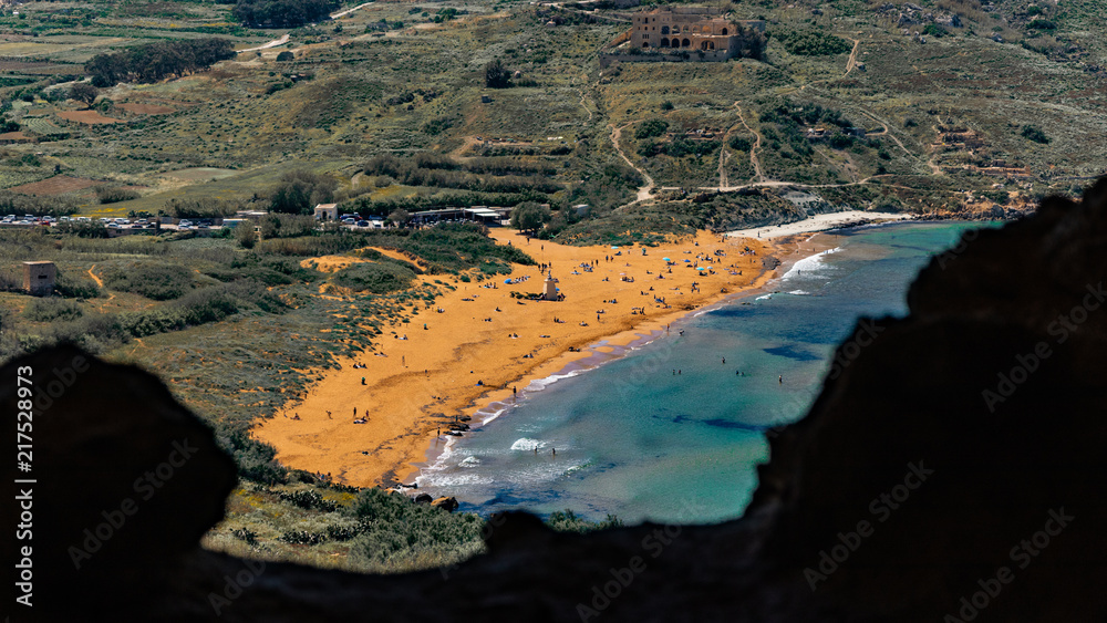 Ramla Bay as seen from Mixta Cave in Gozo