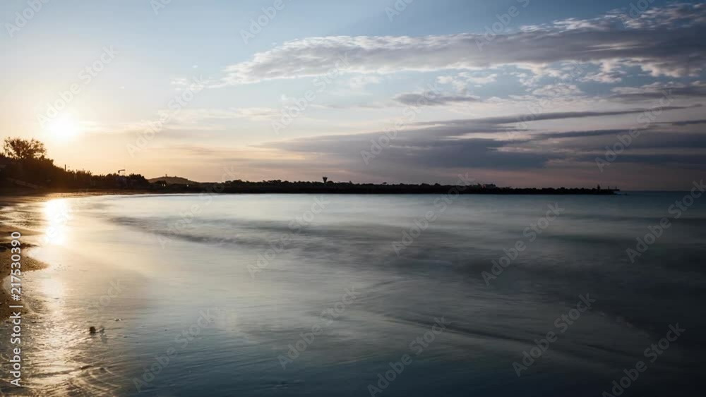 Time lapse of sunrise over a beach on the mediterranean sea, southern France. Time lapse of sunrise over a beach on the mediterranean sea, southern France.