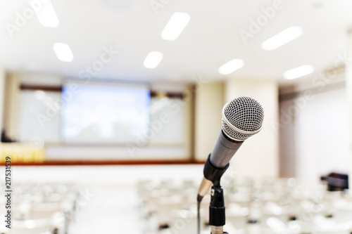 Microphone over the blurred business forum Meeting or Conference Training Learning Coaching Room Concept, Blurred background