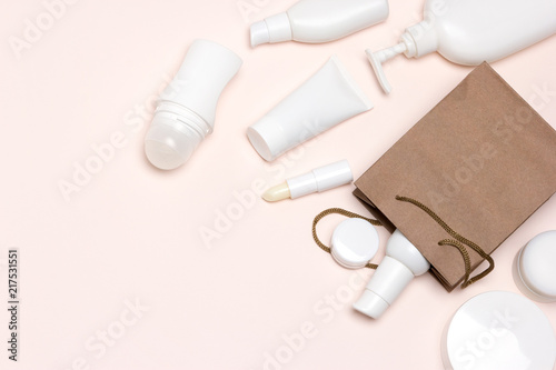 Cosmetic products with paper merchandise bag, copy space