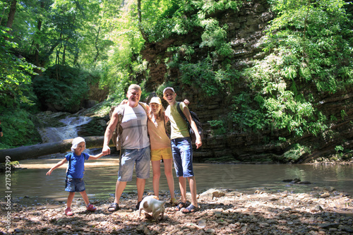 Family walking in a forest